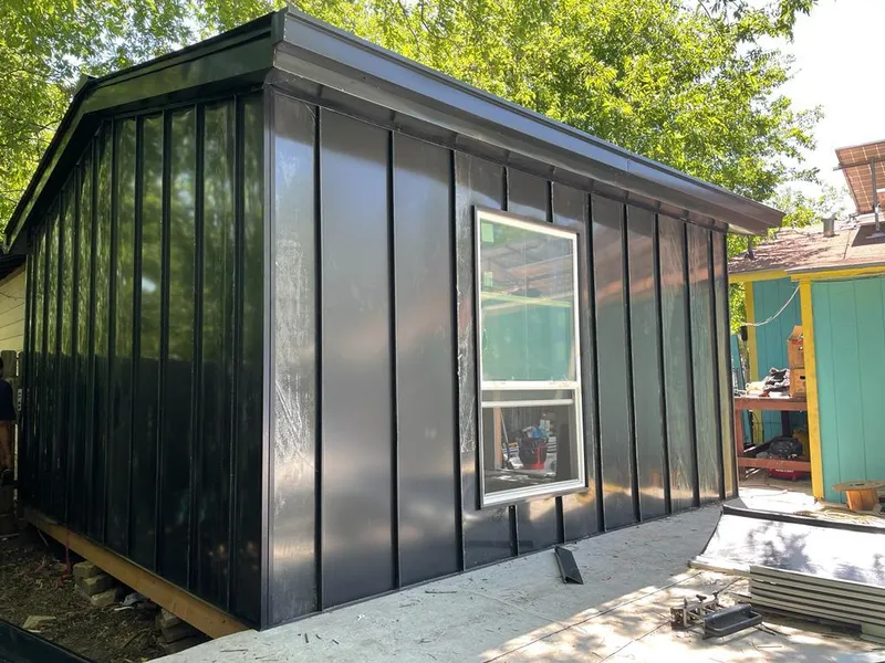 Black standing seam metal wall panels for Metal Roof Installation in Lucas