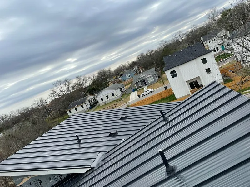 Standing seam metal roof panels with vents for Skylight Repair in Lucas